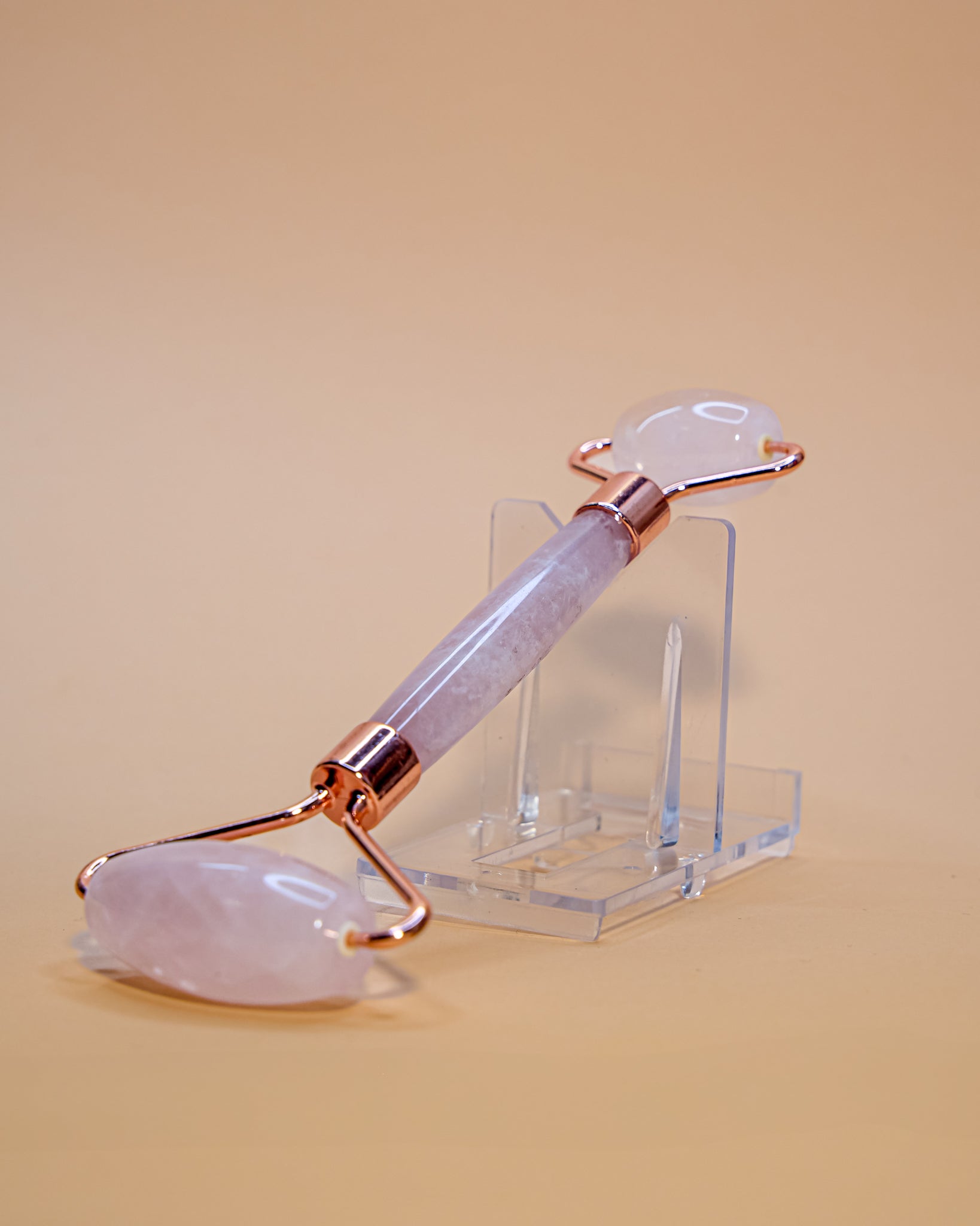 RODILLO MASAJEADOR DE CUARZO ROSA